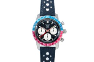 TAG Heuer GMT Autavia GMT watch for men with a black dial, three white sub-dials, bold indices, blue and red bezel, blue leather band