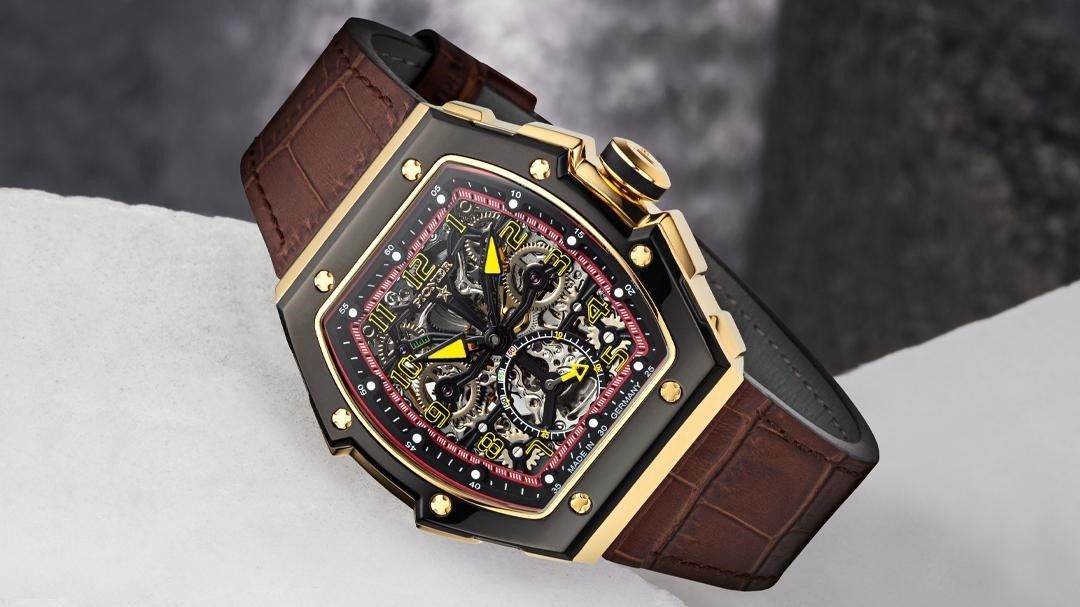 Tufina Milano skeleton watch for men with a brown leather band, multi-colored hands, Arabic numbers and a Incabloc shock protection system